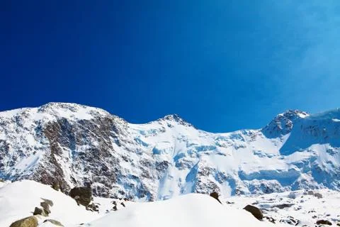 Snow capped mountains Stock Photos