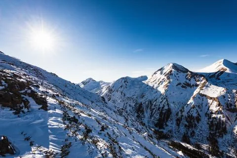 Snow-capped mountains Stock Photos