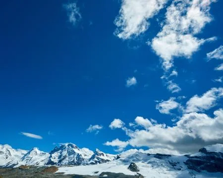Snow capped mountains Stock Photos