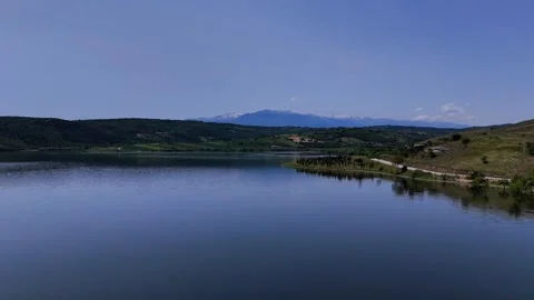 Snow-Capped Mountains Under Clear Blue Sky in İnegöl. Stock Footage 314550077