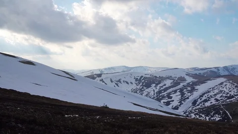 Snow-capped mountainside at sunset Video stock 119225746