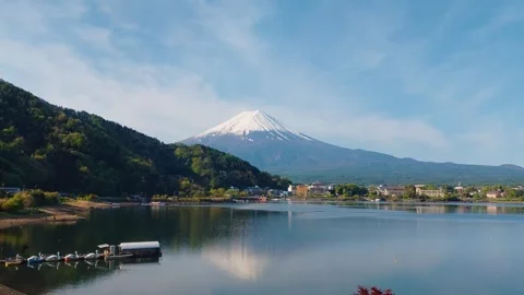 Snow-capped Mt. Fuji landscape overlooking Lake Kawaguchiko in Japan Stock Footage 336577106