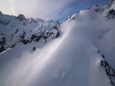 Snow capped peak in Mt Cook National Park, New Zealand from aerial view Stock Footage