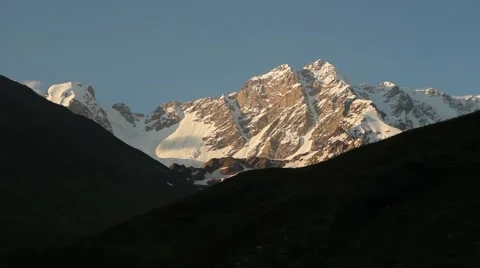 Snow-capped peak at sunset Stock Footage 41465402