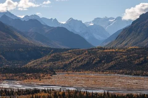 Snow capped peaks in fall 写真素材