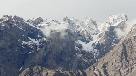 Snow-Capped Peaks of the Karakoram Range in Pakistan, Captured in Early Morning Video stock 314456152