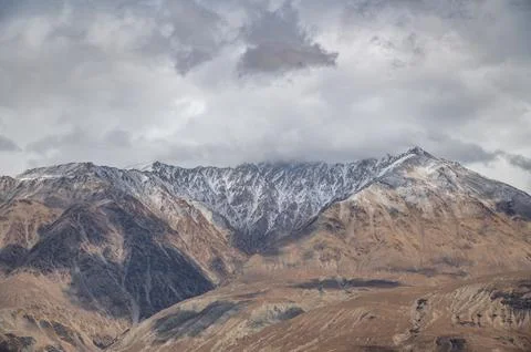 Snow-Capped Peaks over Diskit Valley, Ladakh Stock Photos