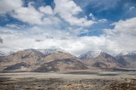 Snow-Capped Peaks over Diskit Valley, Ladakh Stock Photos