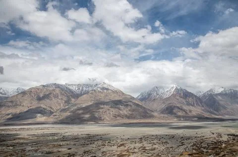 Snow-Capped Peaks over Diskit Valley, Ladakh Stock Photos