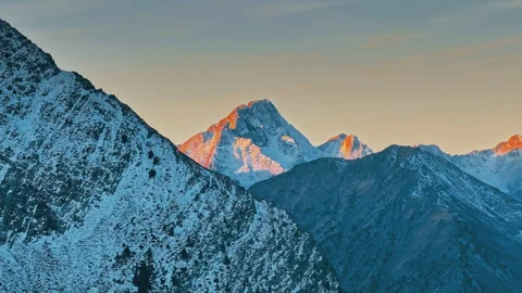 Snow-capped peaks of the Pyrenees at sunset in Spain Stock Footage 306262736