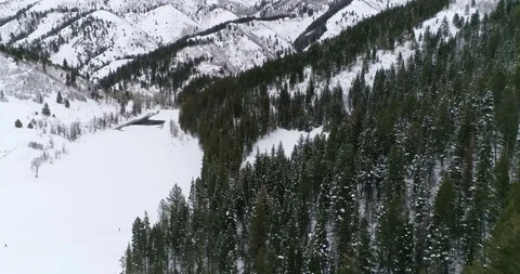 Snow-capped Trees at Tibble Fork Reservoir in the Rocky Mountains of Utah Video stock 102822203