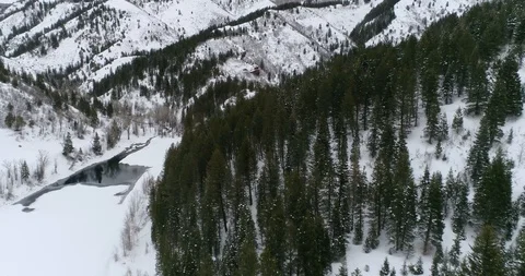 Snow-capped Trees at Tibble Fork Reservoir in the Rocky Mountains of Utah Video stock 102822757