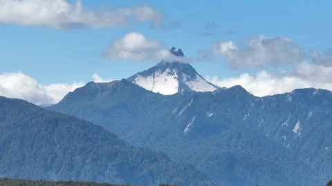 Snow-Capped Volcano Peak with Glacial Volcan Osorno Stock Footage 310612993