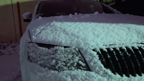 Snow on the car Stock Footage 166474598