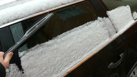Snow on car side window Stock Footage 227007136
