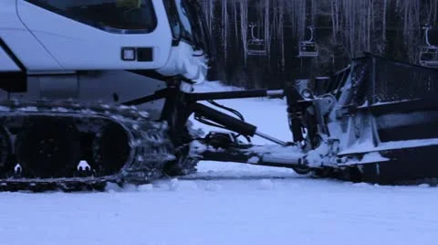 Snow cat drives by grooming ski runs. Stock Footage 21431153