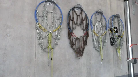 Snow chains for fire engine, hang on the wall Stock Footage 108479141