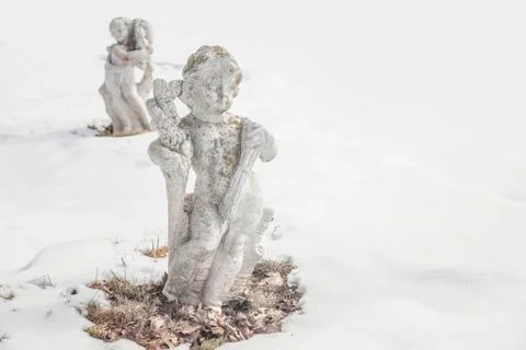 Snow cherubs Stock Photos