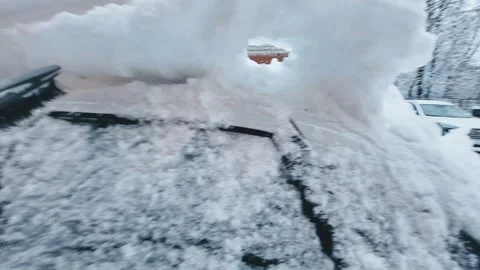 Snow cleaning preparing the car for driving Stock Footage 326499344