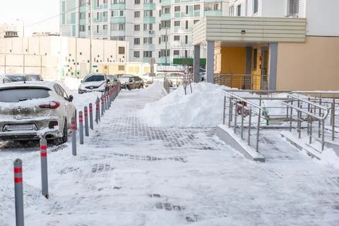 Snow-cleared walking paths. Stock Photos