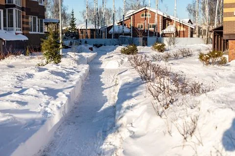 Snow-cleared walking paths. Stock Photos