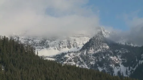 Snow Clouds Massing on Western Mountains 스톡 동영상 54713757