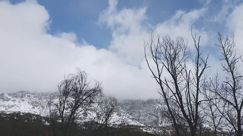 Snow clouds over mountains, time lapse Stock Footage 81744279