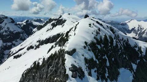 Snow Cornice Ridge, Epic Mountain Scenery, Drone Shot Stock Footage 169554082