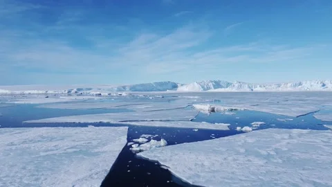 Snow covered antarctic surface aerial view flight. Stock Footage 219753573