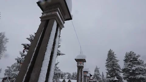 Snow Covered Arctic Circle Pillars at Santa Claus Village in Rovaniemi, Finland Stock Footage 330707795