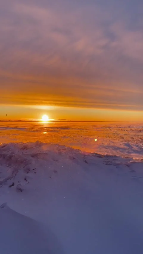 Snow-covered Baltic coast on a winter day at sunset Stock Footage 227412469