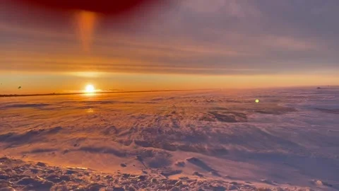 Snow-covered Baltic coast on a winter day at sunset Stock Footage 227412611