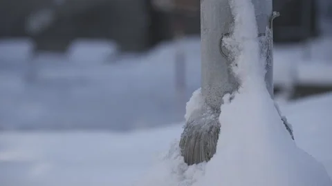 Snow-covered base lamppost 스톡 동영상 295290786