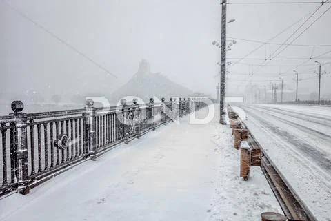 Snow covered bridge during heavy snow storm Stock Photos