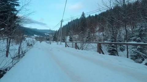Snow-covered bridge. village, tree. Time lapse Stock-Footage 72043748