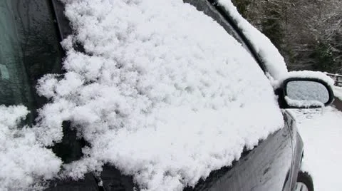 A snow covered car Stock Footage 20493034