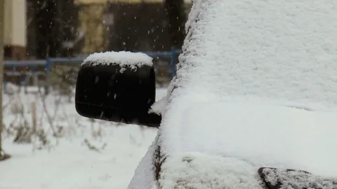 Snow-covered car Stock Footage 84387149
