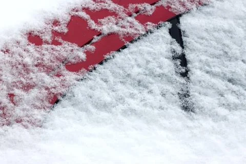 Snow-covered car windshield . Stock Photos