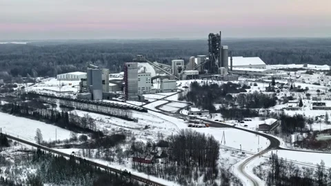 Snow-covered cement plant complex Stock Footage 331190105