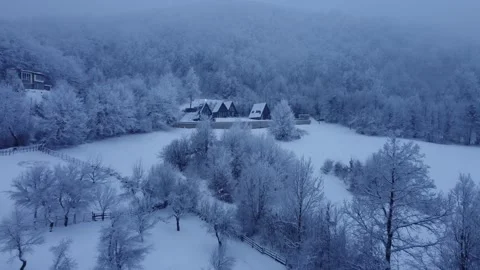 Snow covered chalet in the mountains Video stock 261591810