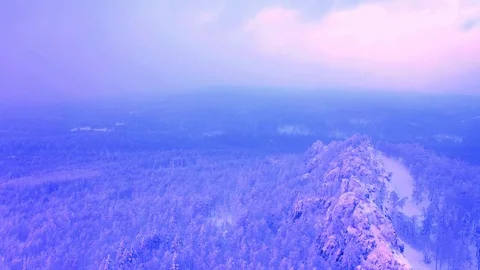 Snow-covered cliffs in the Southern Urals on the Ural-Tau ridge Stock Footage 122929465