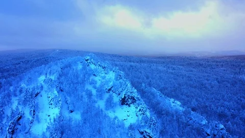 Snow-covered cliffs in the Southern Urals on the Ural-Tau ridge Stock Footage 122929669