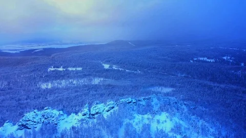 Snow-covered cliffs in the Southern Urals on the Ural-Tau ridge Stock Footage 122930964