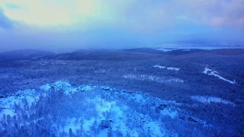 Snow-covered cliffs in the Southern Urals on the Ural-Tau ridge Stock Footage 122931044