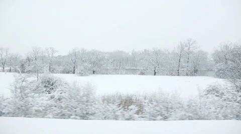 Snow Covered Countryside seen by Train Stock Footage 33685591