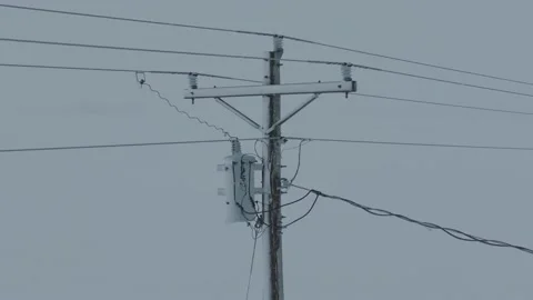Snow Covered Electrical Transformer Utility Power Line Pole Rural Iowa Stock Footage 235566030