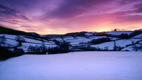 Snow covered fieldd of devon Stock Photos