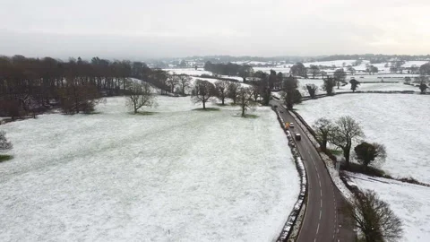 Snow Covered Fields Winter Countryside Scene 2.7k Stock Footage 148039960