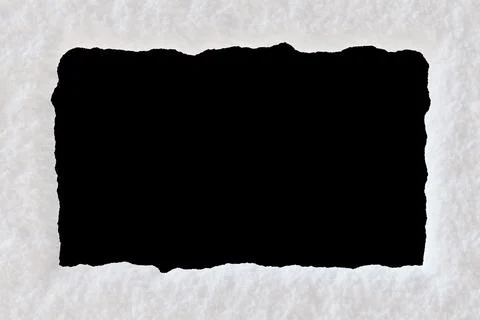 Snow-covered frame with empty space in the middle, isolated on black backgr.. Stock Photos