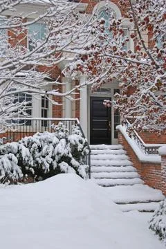 Snow covered front steps of a house Stock Photos